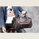Stylish brown luxury business travel bag made from leather, perfect for elegant trips and professional use