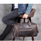 Luxury business travel bag made of leather, featuring sturdy handles for stylish commuting