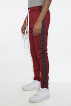 Mens burgundy black track pants by VacationGrabs with side stripes and adjustable drawstring