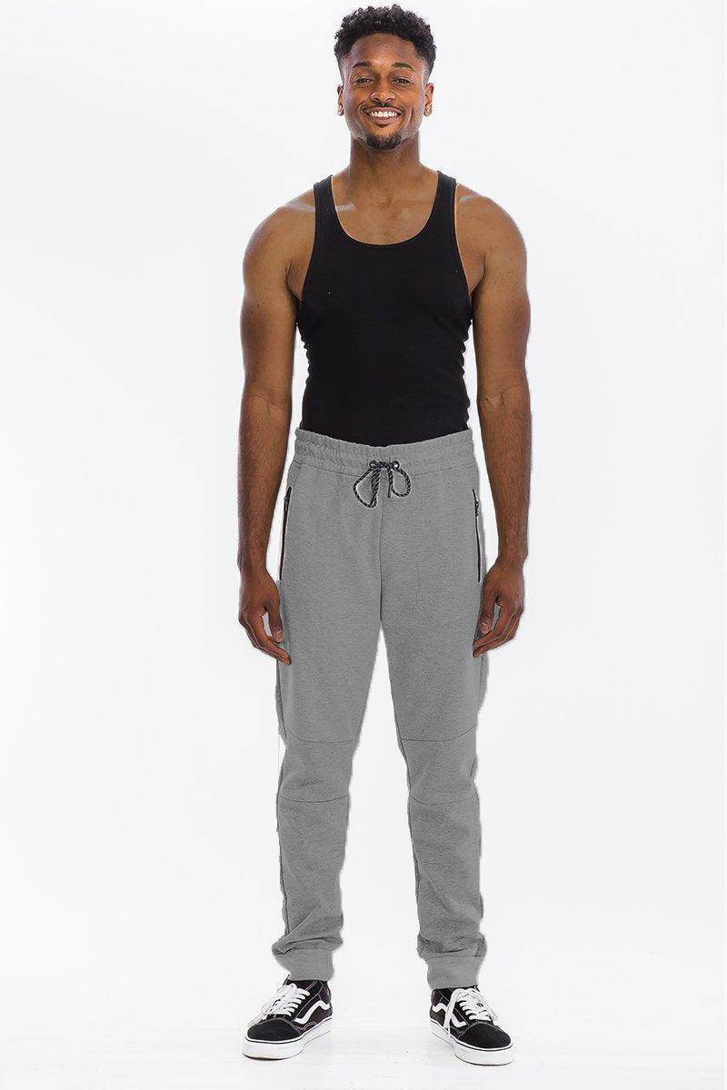 Mens gray sweatpants from VacationGrabs with an elastic waistband and side pockets