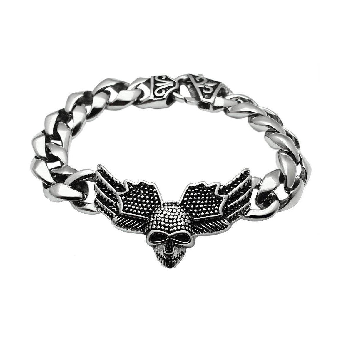 Men's high polished skull bracelet with wing design on a silver chain for edgy style