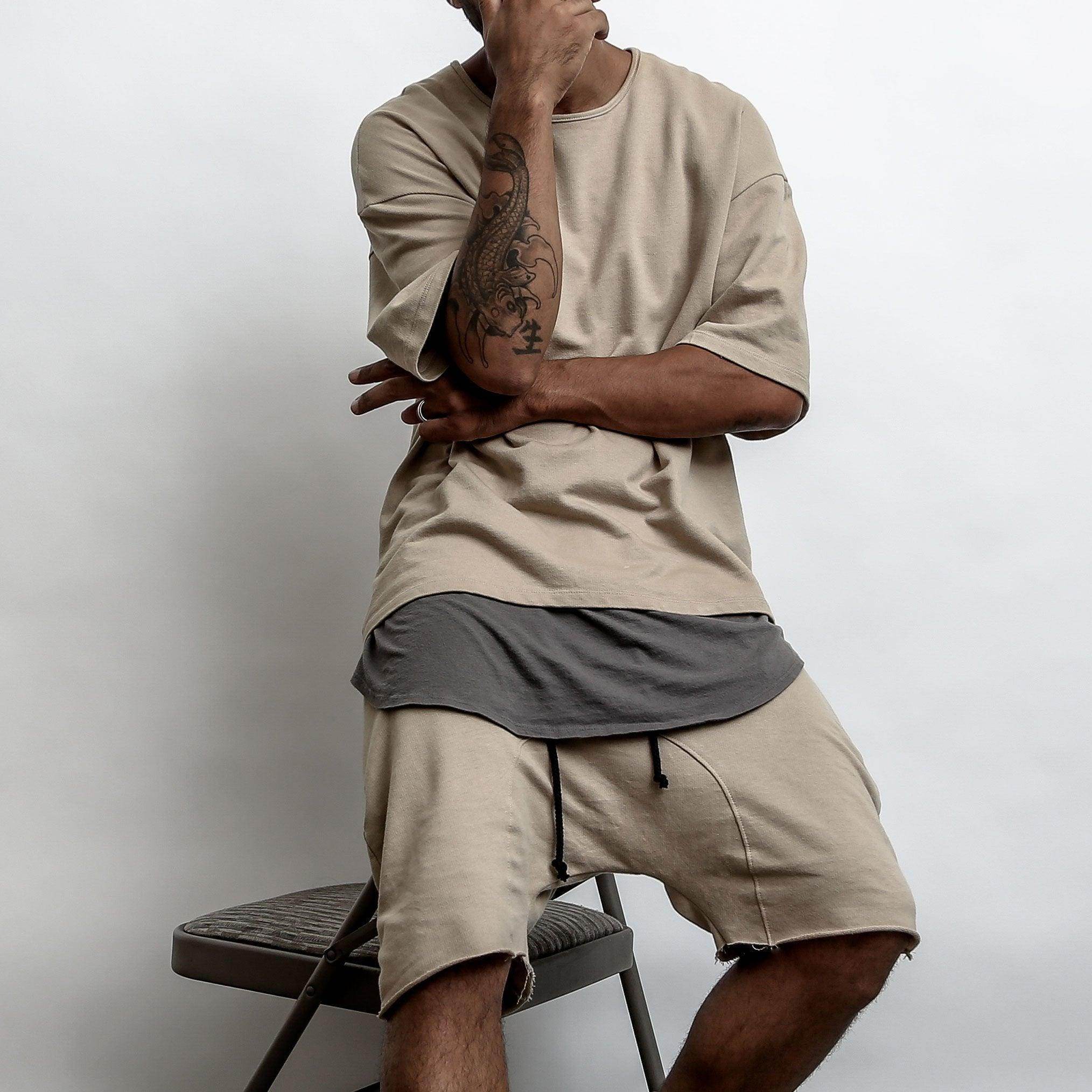 Stylish mens khaki shorts with a relaxed fit and drawstring waist for casual summer wear