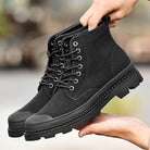 Stylish men's leather walking boots in black with durable soles for all-day comfort