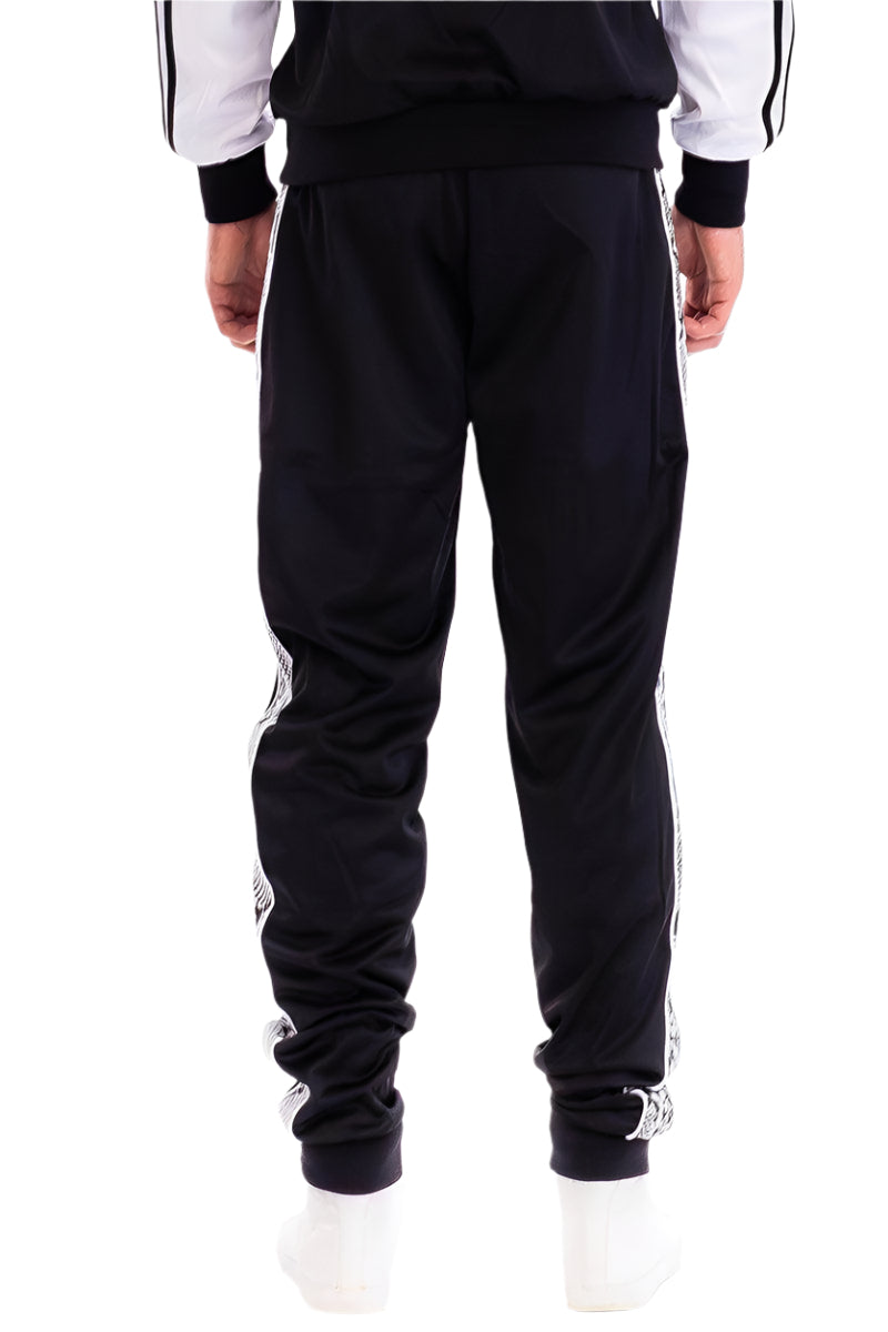 Men's Snake Stripe Track Pants from VacationGrabs with a sleek black design and sporty side stripes