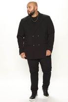 Men's modern slim fit trousers black paired with a stylish double-breasted blazer for a sleek look