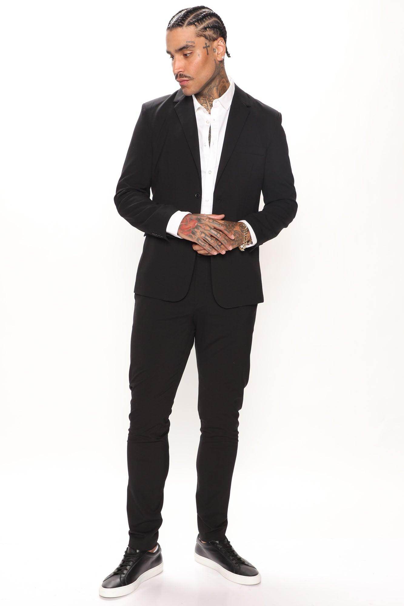 Men's modern slim fit trousers black paired with a sleek blazer and formal shirt for a stylish look