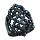 Montana Queen ring featuring intricate black design with blue crystal accents for a stunning look