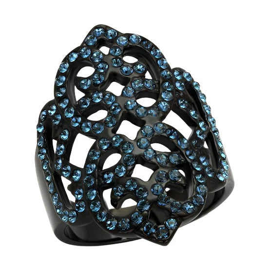 Montana Queen ring featuring intricate black design with blue crystal accents for a stunning look