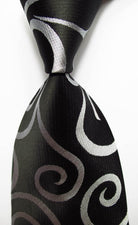 Elegant black patterned silk neckties with a sophisticated swirl design for stylish men's attire