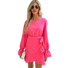 Trendsi pink vacation dress with long sleeves and a stylish ruffled hem for summer outings