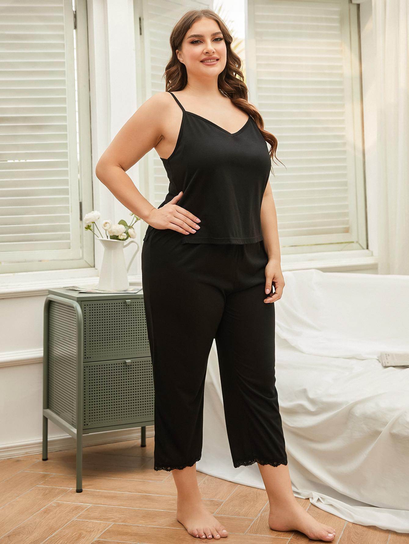Trendsi plus size lace pajama set in black featuring a comfortable top and cropped pants