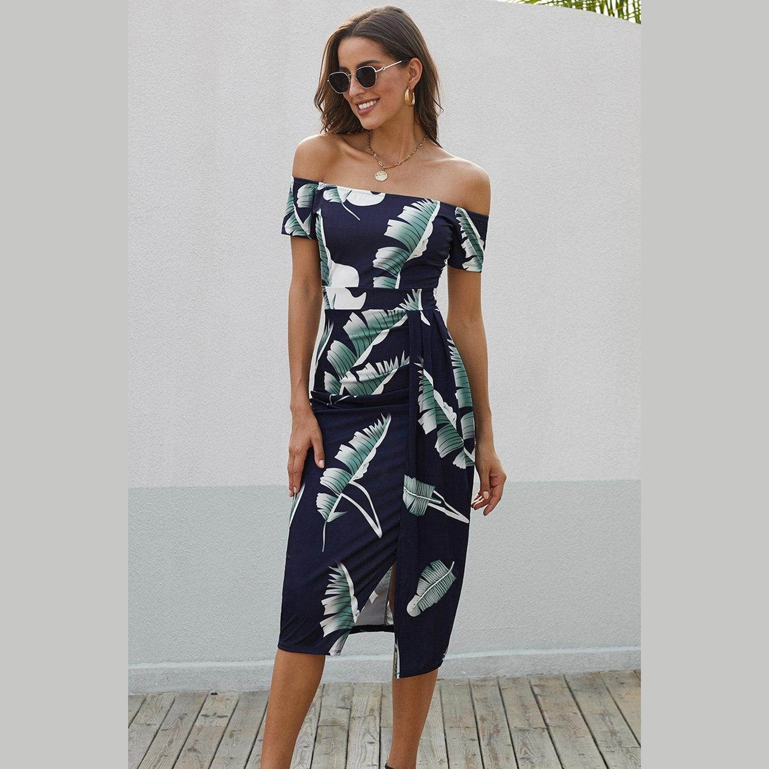Trendsi printed split maxi dress featuring an off-shoulder design with tropical leaf patterns
