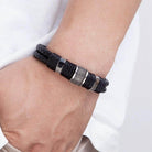 Men's punk stainless steel bracelet with woven black leather design for a stylish look