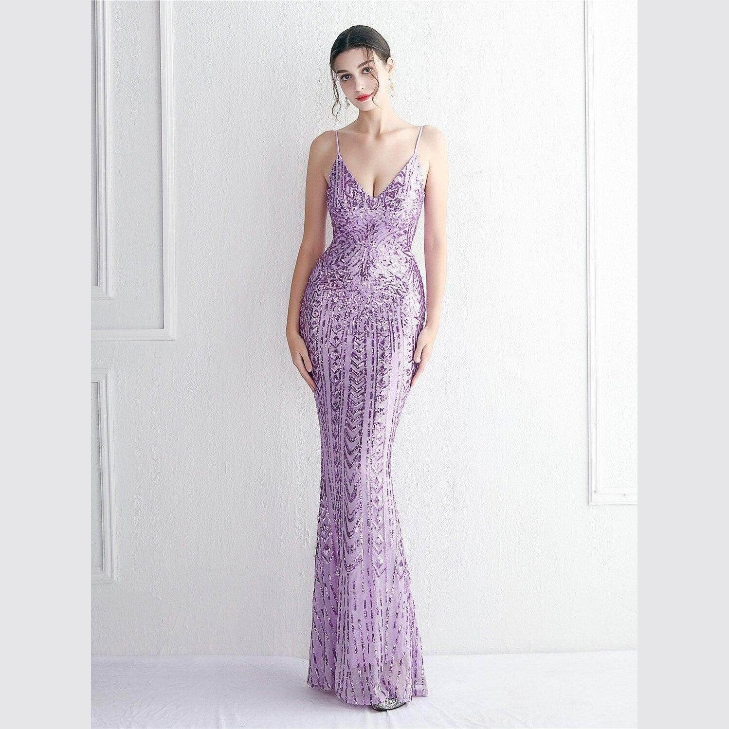 Elegant purple sequin dress women featuring a fitted silhouette and shimmering details for special occasions