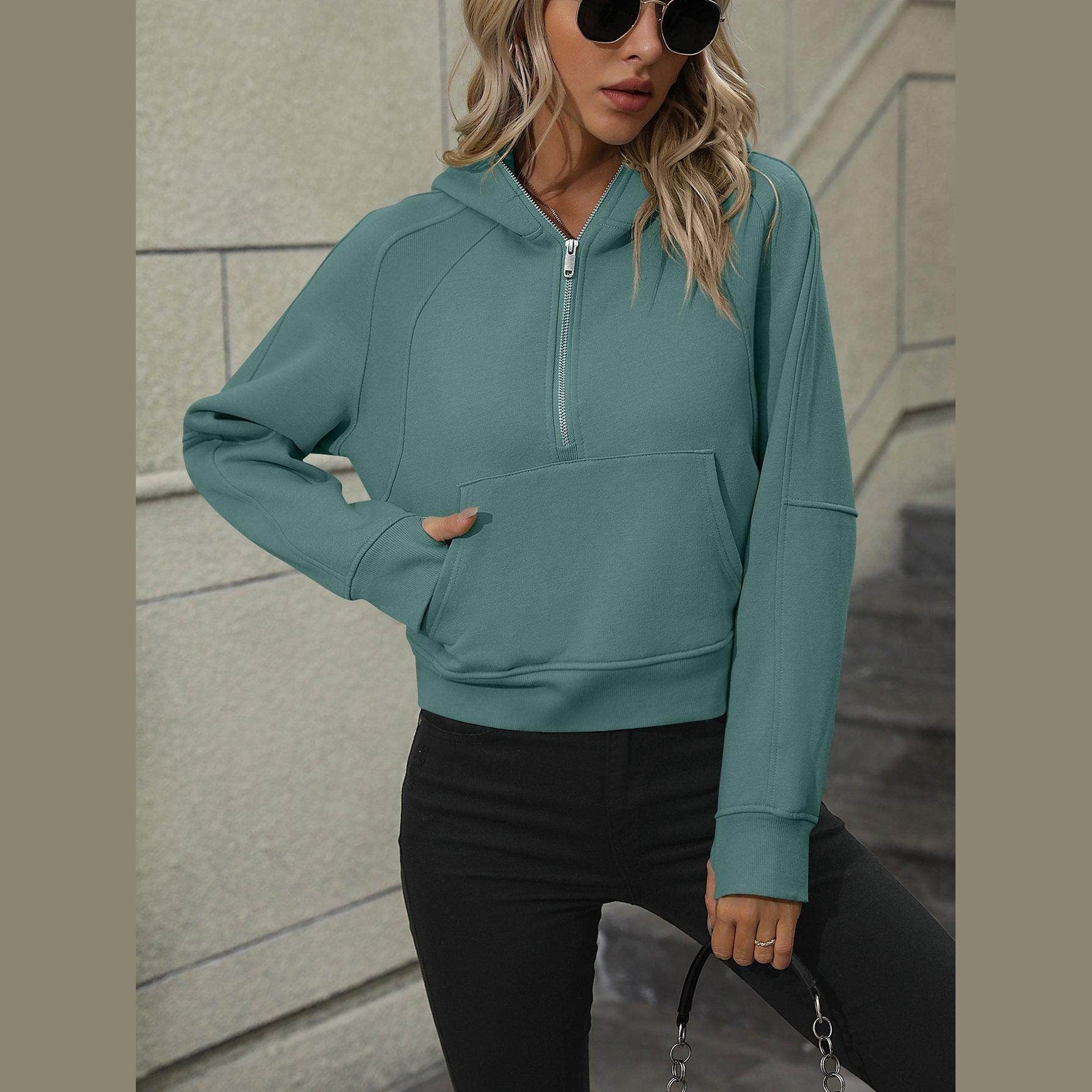 Trendsi Women's raglan sleeve hoodie in teal with a half-zip design and front pocket