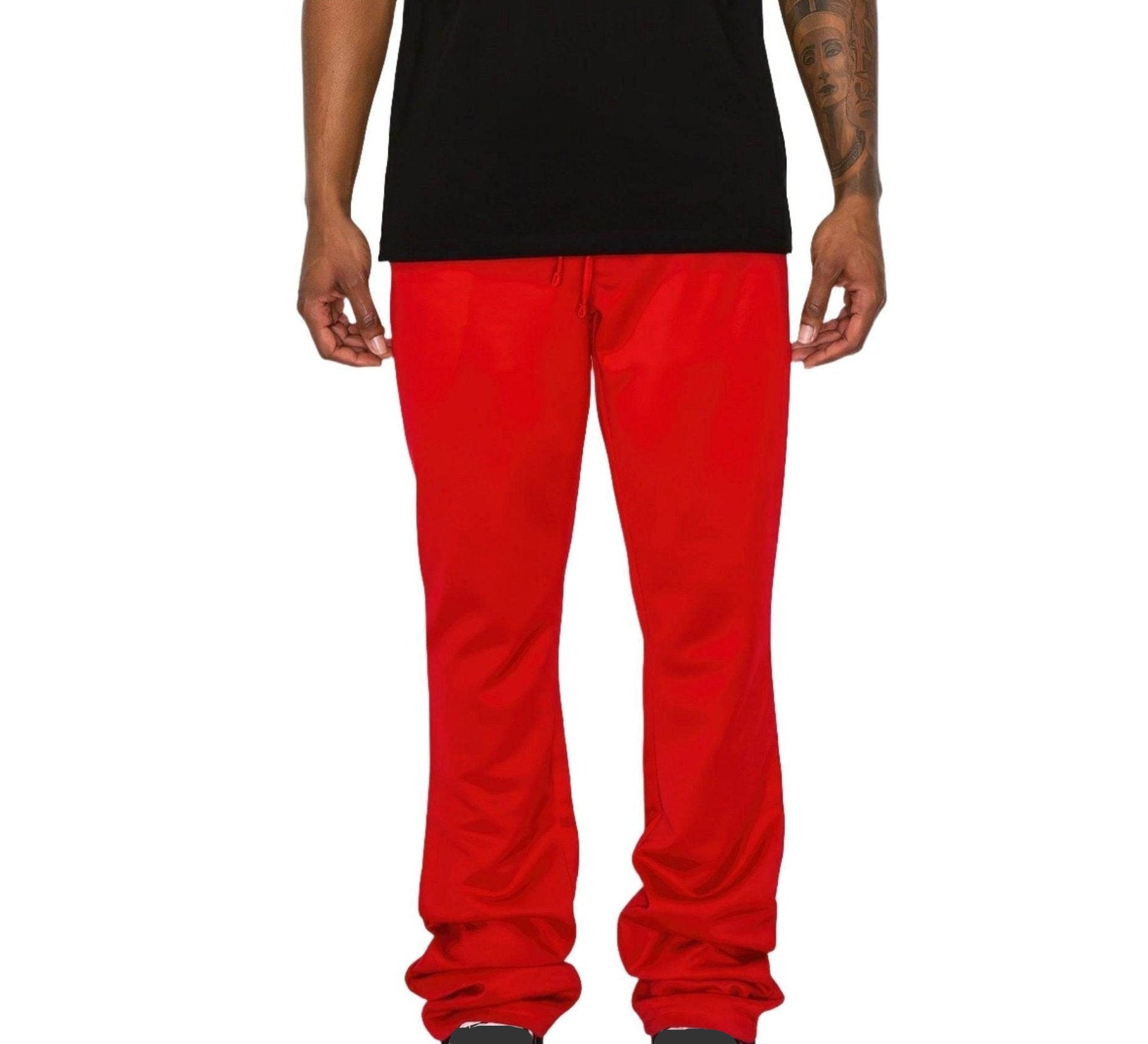 Men's red flare track pants by VacationGrabs, featuring a relaxed fit and drawstring waist