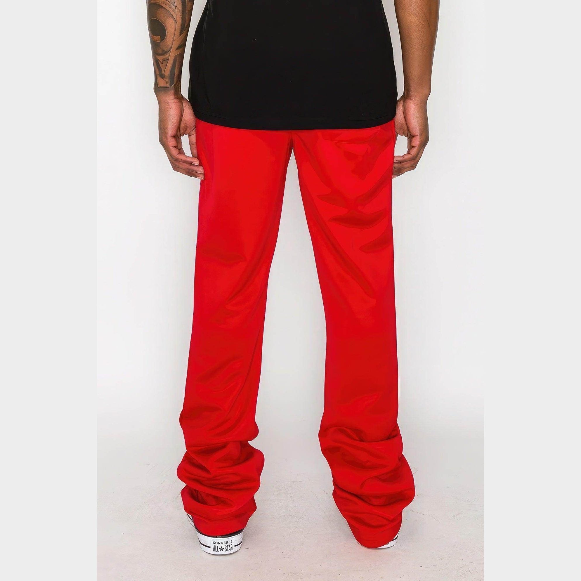 Men's red flare track pants from VacationGrabs with a loose fit and comfortable design