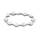 Rhodium brass geometric bracelet featuring sparkling crystals in a stylish design