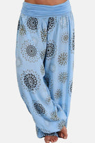 Trendsi ruched full size pants in blue with decorative floral patterns for a stylish casual look