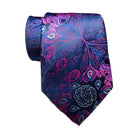 Elegant silk paisley necktie with vibrant blue and pink patterns, perfect for formal occasions