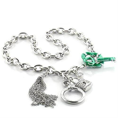 Silver chunky chain necklace with charms featuring a green accent and decorative tassels