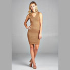 Elegant sleeveless V-neck sweater dress in beige, showcasing a fitted silhouette for a stylish look.