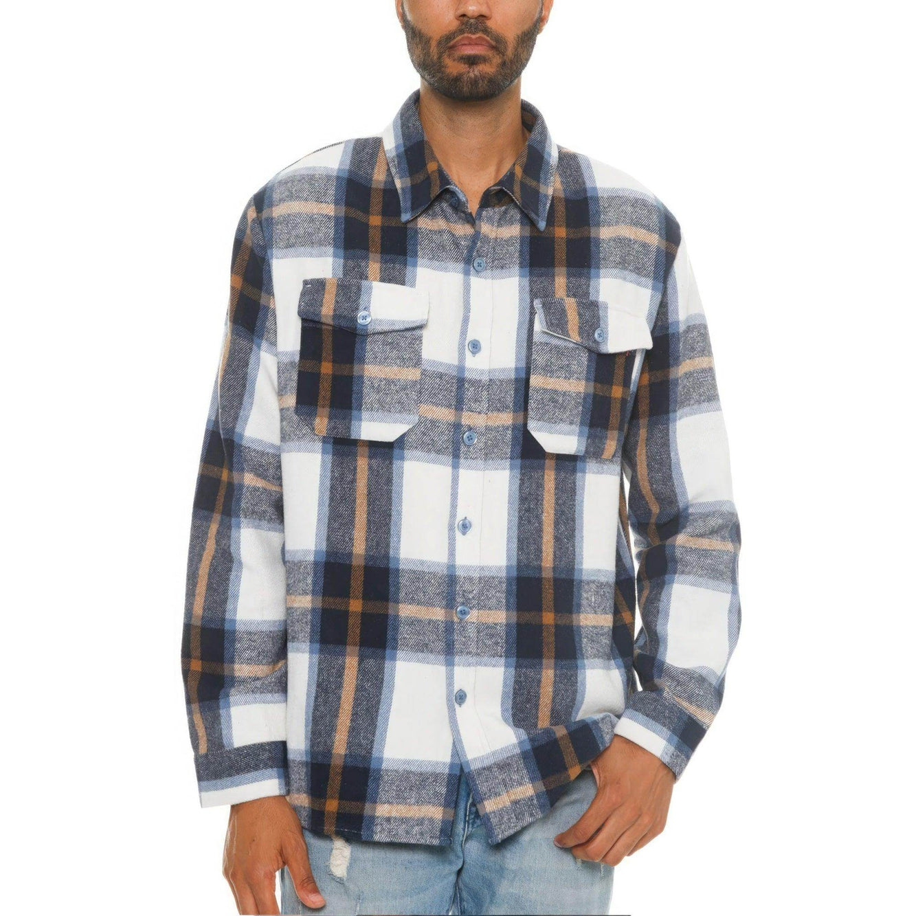 Model wearing a soft flannel shacket for men in a blue, brown, and white plaid pattern with chest pockets