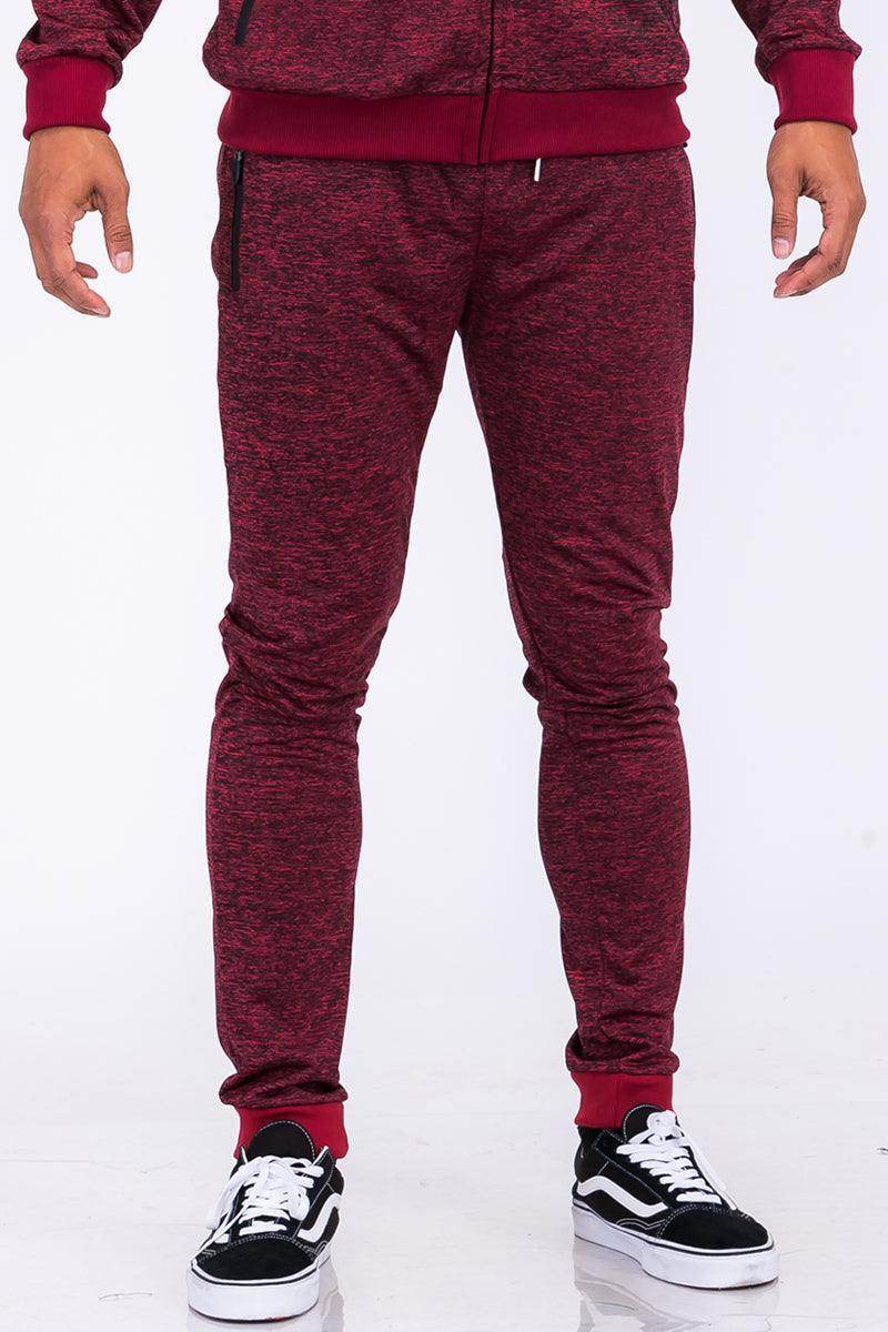 Men's VacationGrabs speckled jogger pants in burgundy with a snug fit and zip pockets