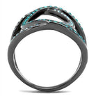 Stainless steel crystal jewelry ring with a unique wave design and sparkling blue crystals