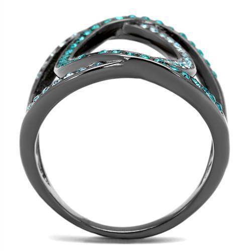 Stainless steel crystal jewelry ring with a unique wave design and sparkling blue crystals