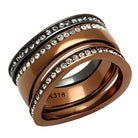 Set of stainless steel crystal rings with sleek design and sparkling accents for stylish women
