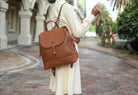 Brown Pink Orpheus stylish backpack handbag with a modern design for daily use