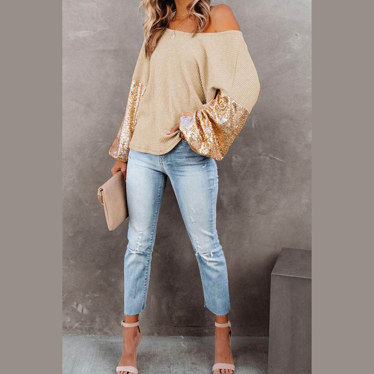 Trendsi stylish vacation blouse with off-shoulder design and sequin sleeves, paired with jeans