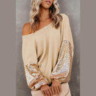 Trendsi stylish vacation blouse with off-shoulder design and sequined sleeves for a chic summer look