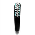 Stylish synthetic crystal sea ring with blue and clear stones on a sleek black band