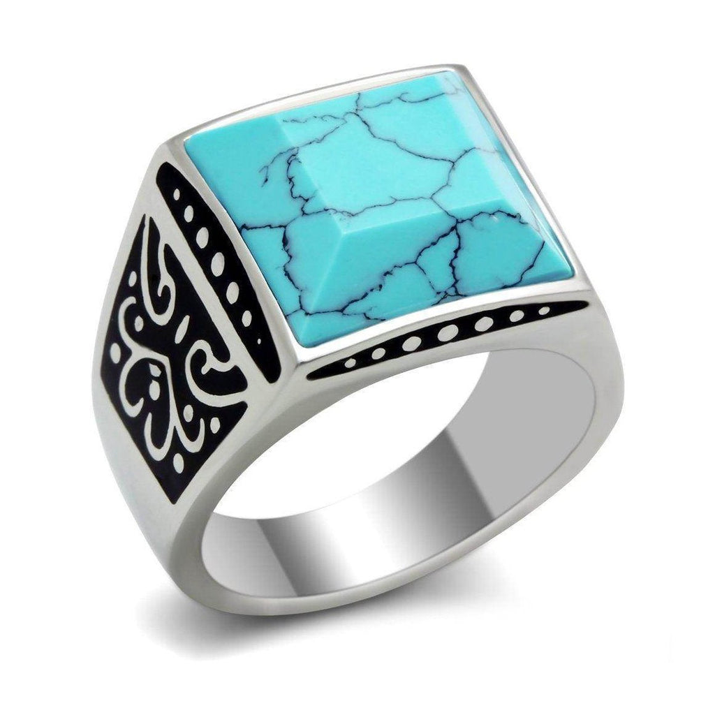 Men's synthetic turquoise jewelry ring with intricate black designs and a polished silver band
