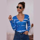 Trendsi tie-dye deep V-neck shirt in blue with button detailing and long sleeves