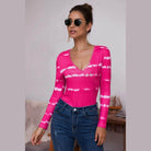 Trendsi tie-dye deep V-neck shirt in pink with button details and long sleeves