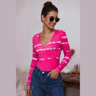 Trendsi tie-dye deep V-neck shirt in pink with long sleeves and stylish button detail