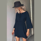 Trendsi tie neck vacation dress in navy blue with bell sleeves and a flattering fit