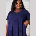 Trendsi tiered summer dress in navy blue with short sleeves and pockets for a comfortable look
