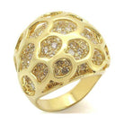 Unique gold statement ring with intricate design and sparkling stones for a bold look