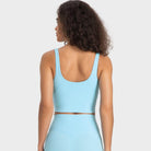 Light blue women's activewear crop top for vacation style sportswear with a comfortable fit