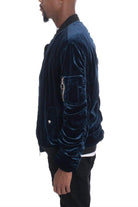 Velour bomber jacket for men in navy blue with a sleek design and zippered pockets