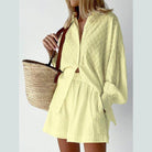 Stylish women's lantern sleeve shirt and shorts set in light yellow for a trendy summer look