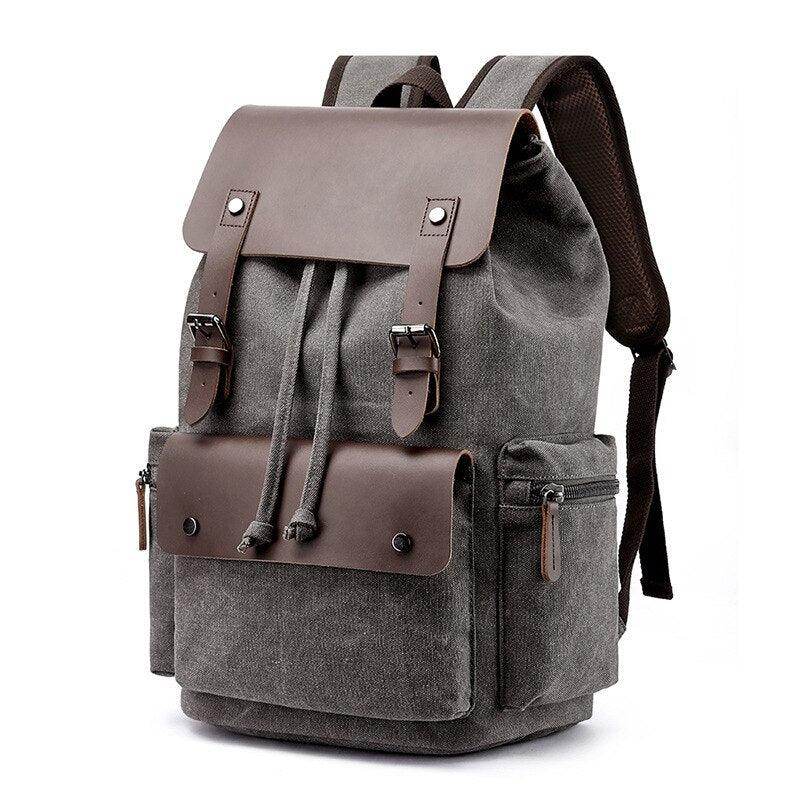 Vintage canvas travel backpack with leather accents and multiple compartments for easy organization