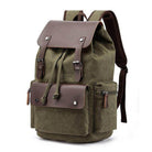 Vintage canvas travel backpack with adjustable straps and multiple pockets for convenient organization