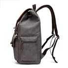 Vintage canvas travel backpack with adjustable straps and side pocket for convenient storage