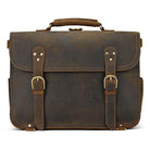 Vintage leather laptop bag with brass buckles and a sturdy handle for professional use