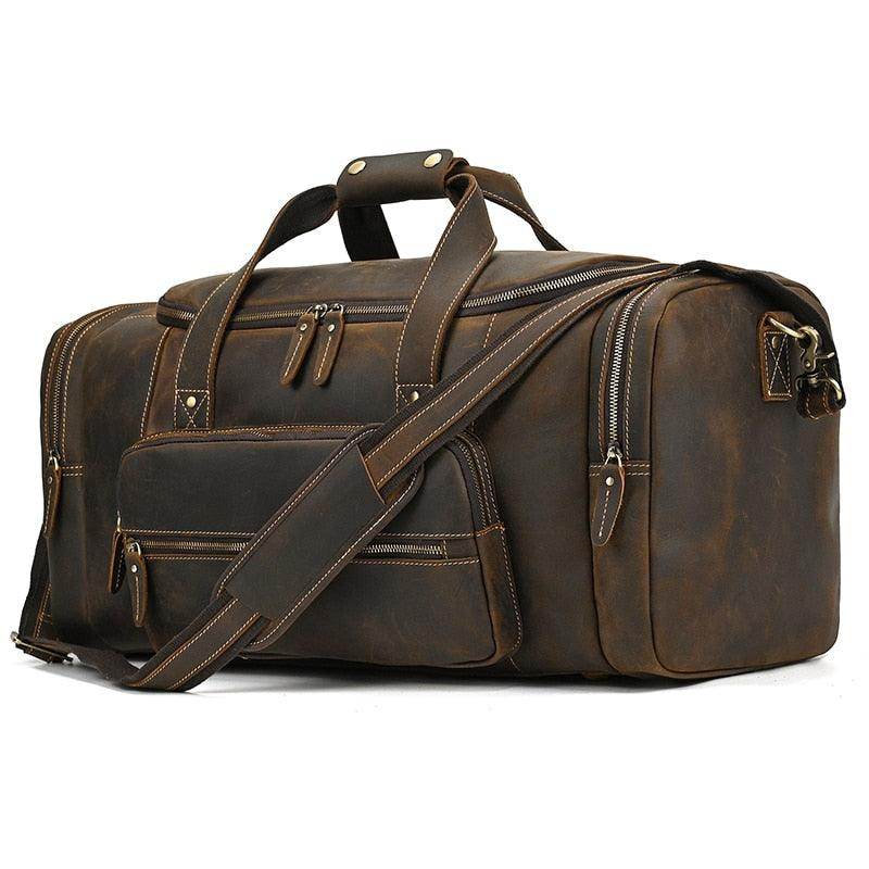 Brown leather weekend travel bag with multiple compartments for organized packing